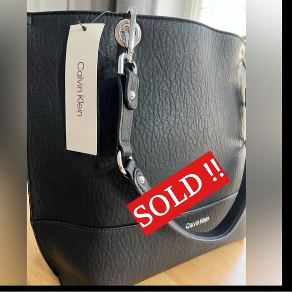 Calvin Klein Handbags - CALVIN KLEIN - purse color black leather with silver hardware.